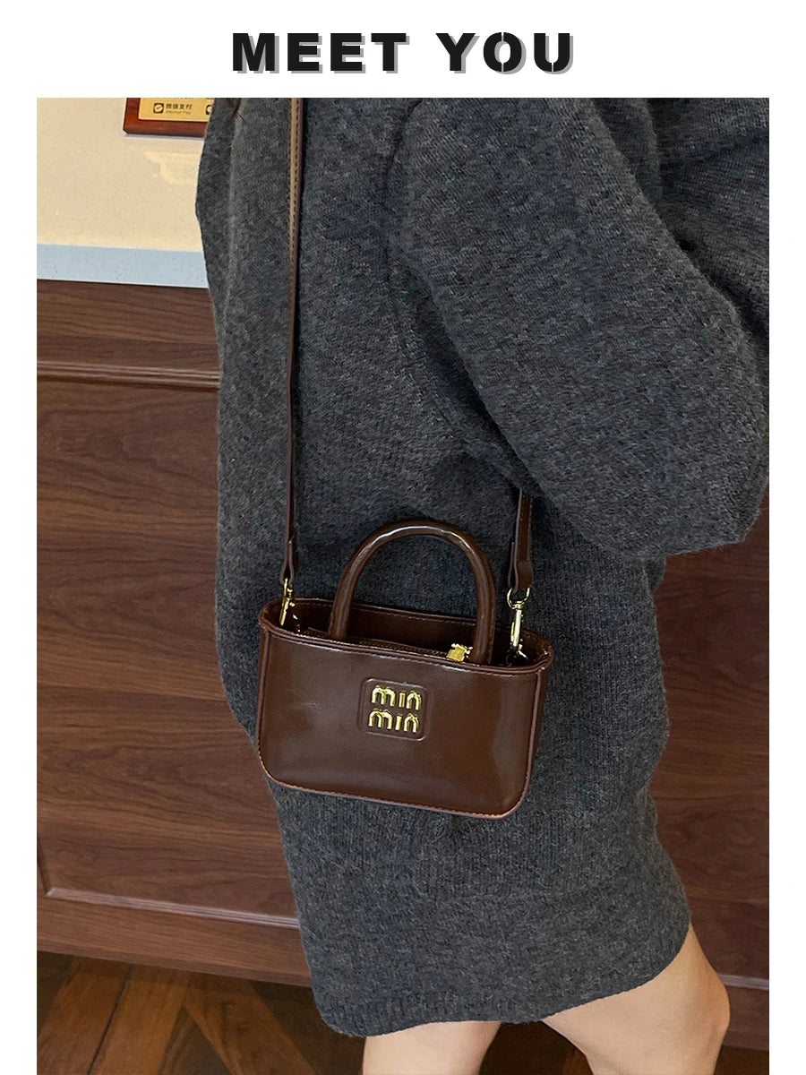 Super fire exquisite mini small bag female 2025 new high-end light luxury designer niche design messenger bag lipstick bag