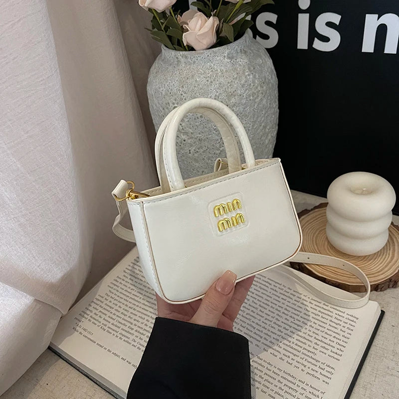 Super fire exquisite mini small bag female 2025 new high-end light luxury designer niche design messenger bag lipstick bag