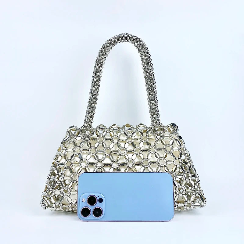 Korean version personalized woven hollowed out high aesthetic ceiling versatile handbag shiny handmade pearl tote underarm bag