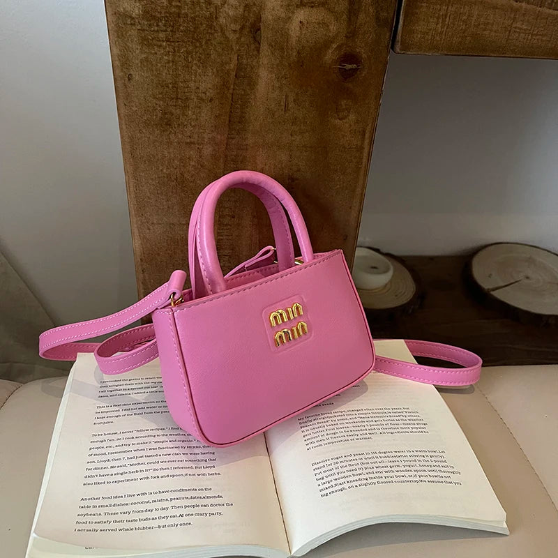 Super fire exquisite mini small bag female 2025 new high-end light luxury designer niche design messenger bag lipstick bag