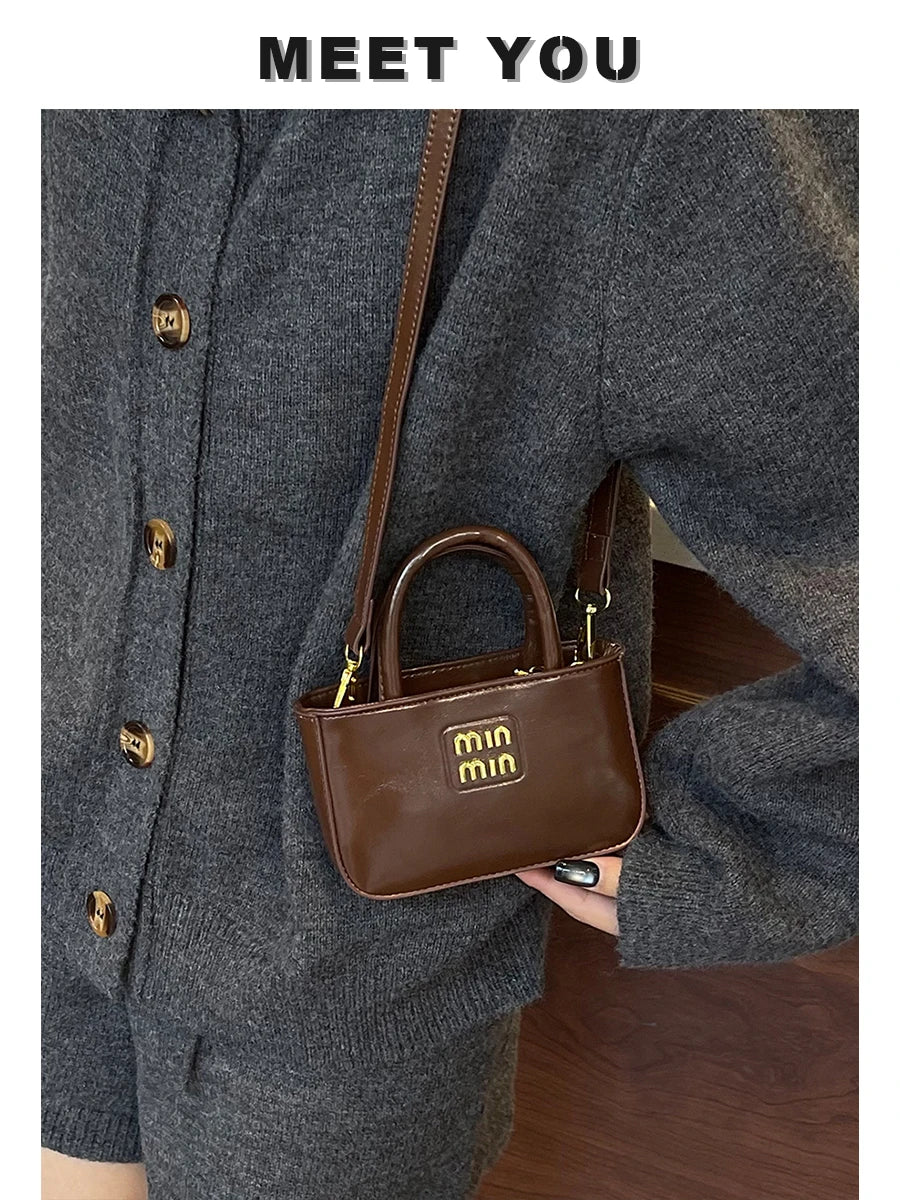 Super fire exquisite mini small bag female 2025 new high-end light luxury designer niche design messenger bag lipstick bag