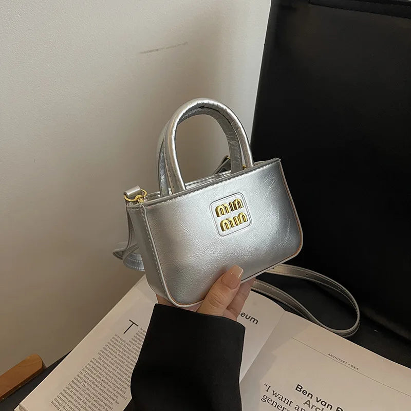 Super fire exquisite mini small bag female 2025 new high-end light luxury designer niche design messenger bag lipstick bag