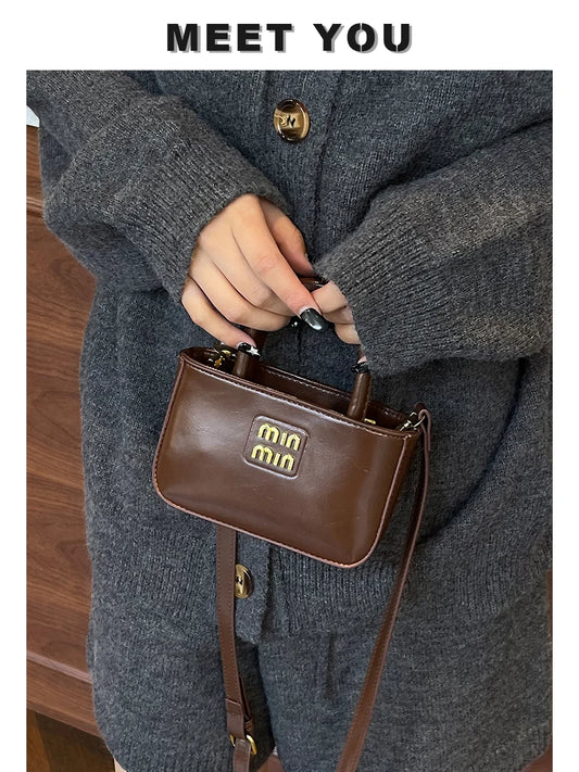 Super fire exquisite mini small bag female 2025 new high-end light luxury designer niche design messenger bag lipstick bag