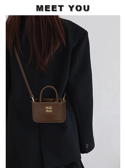 Super fire exquisite mini small bag female 2025 new high-end light luxury designer niche design messenger bag lipstick bag