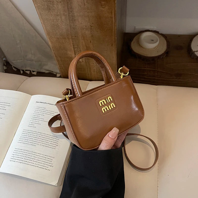 Super fire exquisite mini small bag female 2025 new high-end light luxury designer niche design messenger bag lipstick bag