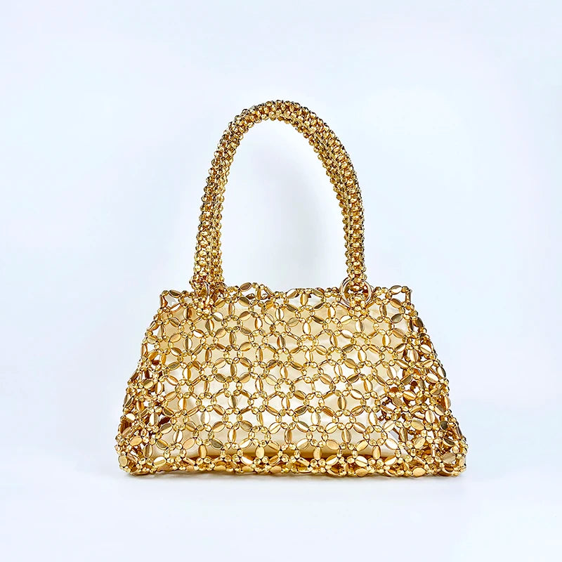 Korean version personalized woven hollowed out high aesthetic ceiling versatile handbag shiny handmade pearl tote underarm bag