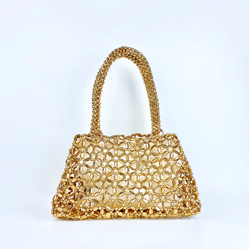 Korean version personalized woven hollowed out high aesthetic ceiling versatile handbag shiny handmade pearl tote underarm bag