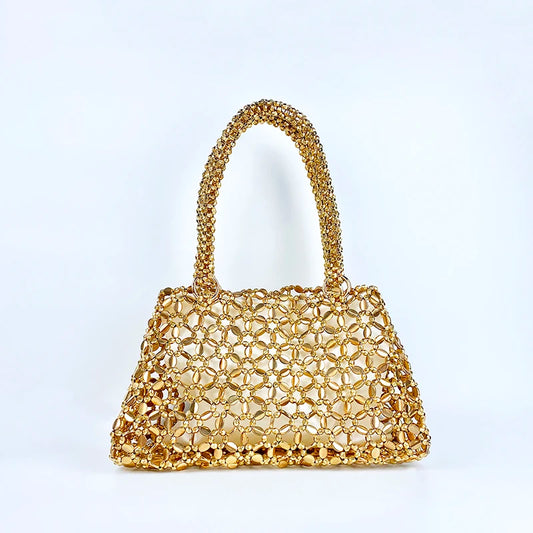 Korean version personalized woven hollowed out high aesthetic ceiling versatile handbag shiny handmade pearl tote underarm bag