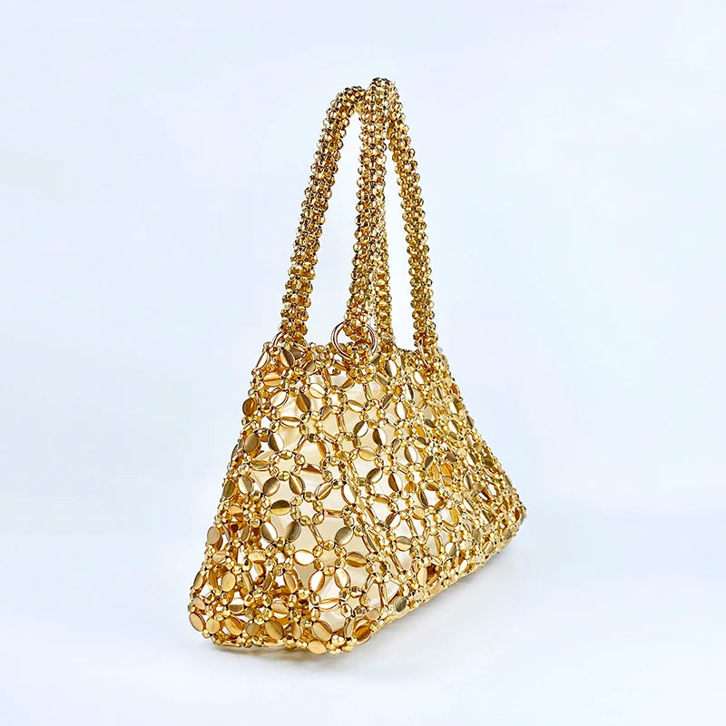 Korean version personalized woven hollowed out high aesthetic ceiling versatile handbag shiny handmade pearl tote underarm bag